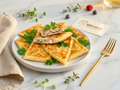 Plated dish of folded flatbread with herbs on a marble surface, featuring 'Miss Sassy' brand.